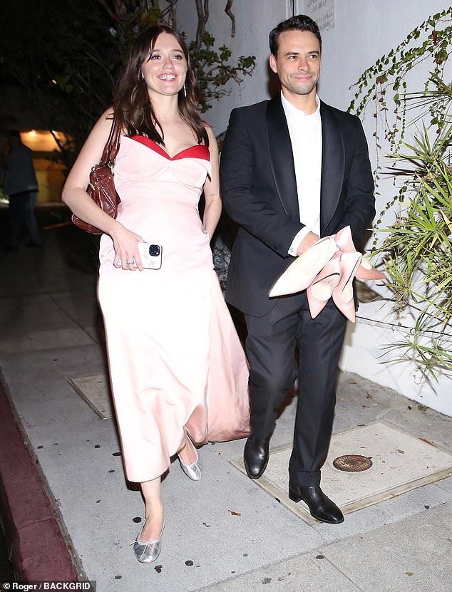 The couple put on a cosy display at the star studded bash