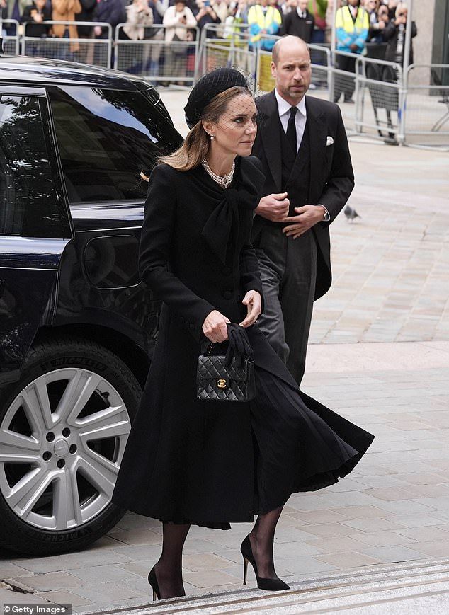 Kate was pictured arriving at the Cathedral, alongside her husband the Prince of Wales, this afternoon