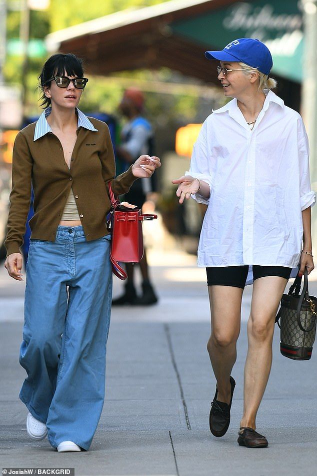 She was joined by a friend as they walked around the city and made the most of the sunny weather