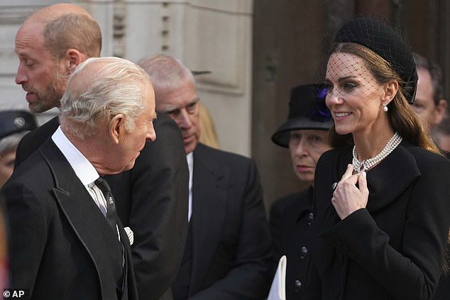 With her husband William, 43, nearby, they appeared to exchange some brief words while paying their respects for the late royal