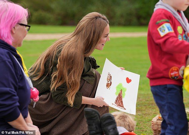 The Princess of Wales was seen showcasing adorable drawings that she and the scouts had created