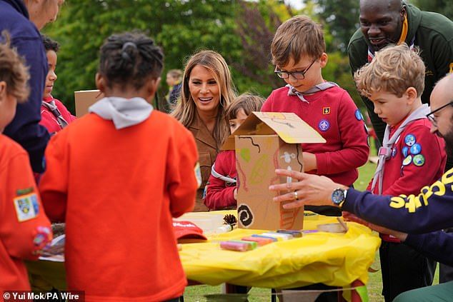 Melania Trump was seen sitting with children as they took part in arts and crafts