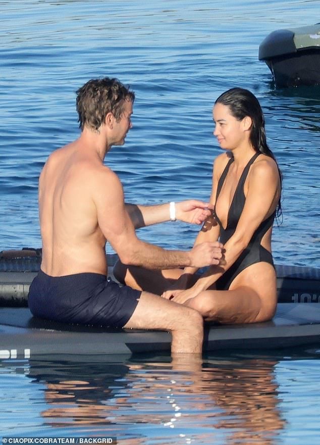 The 40-year-old actor was seen packing on the PDA with bikini-clad 28-year-old Filipina model on vacation in Sardinia, Italy