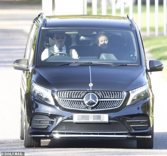 The Duchess of York is photographed in the back seat of a Mercedes-Benz V-Class car today