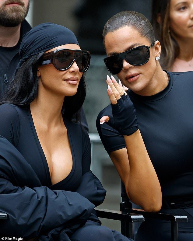 Khloe and Kim showed off their gym-honed physiques in skin-tight tops for the event which took over New York Public Library