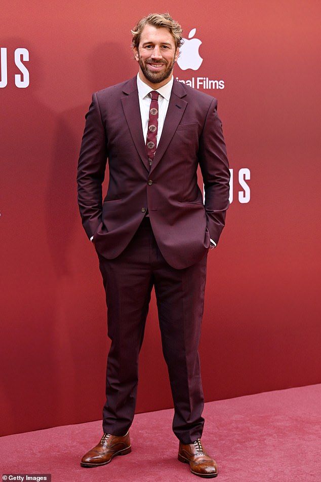 Chris Robshaw wore a burgundy suit with a patterned tie