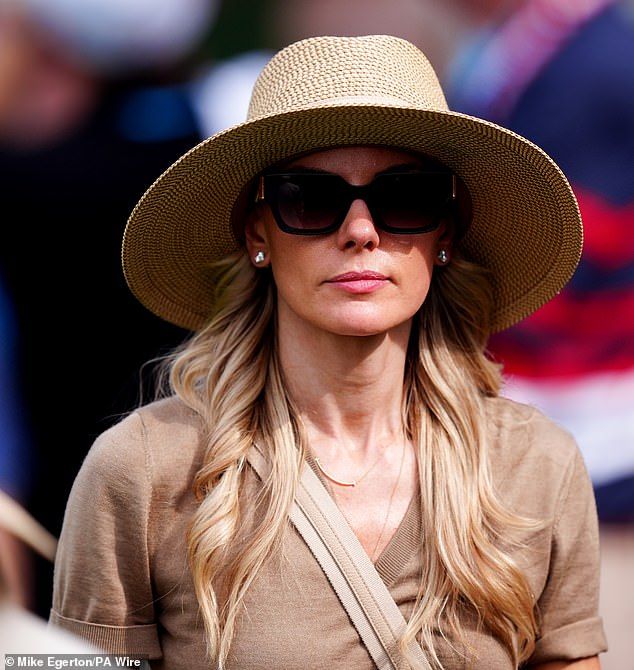 The mother-of-one (pictured) 'handled everything this week with class and poise and dignity', according to Rory, after she was hit by a can of beer thrown from the crowd