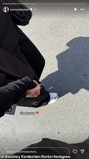 The Kardashians producer-star Instastoried a snap of her holding Kris' hand