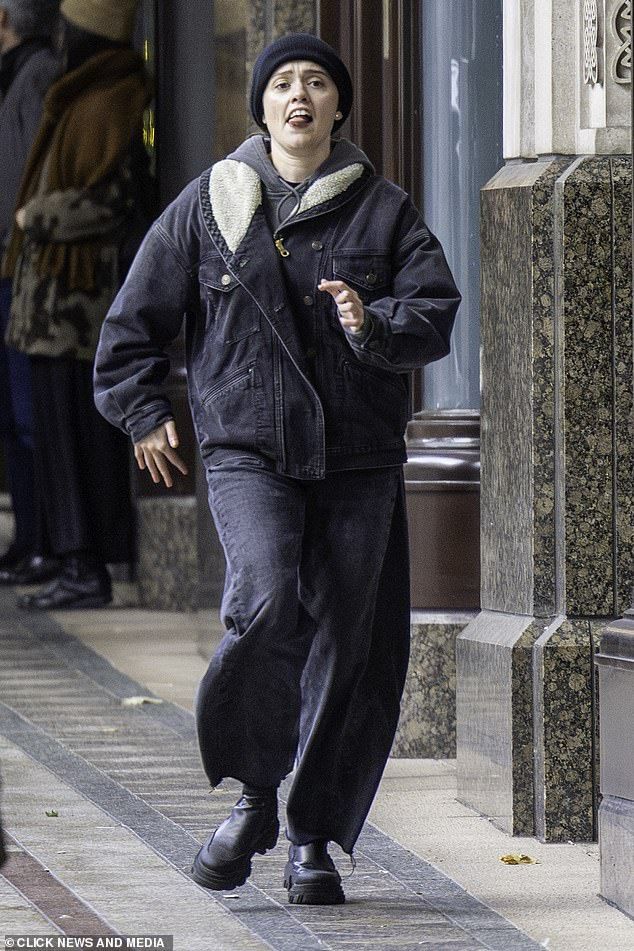 Aimee Lou Wood has said she has no regrets over calling out a 'mean' SNL sketch that poked fun at her teeth as she continued filming for Anxious People on Monday