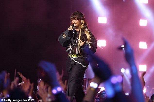 Lola Young has revealed she will be cancelling her remaining tour dates to take a break from the public eye, days after sparking concern by collapsing on-stage