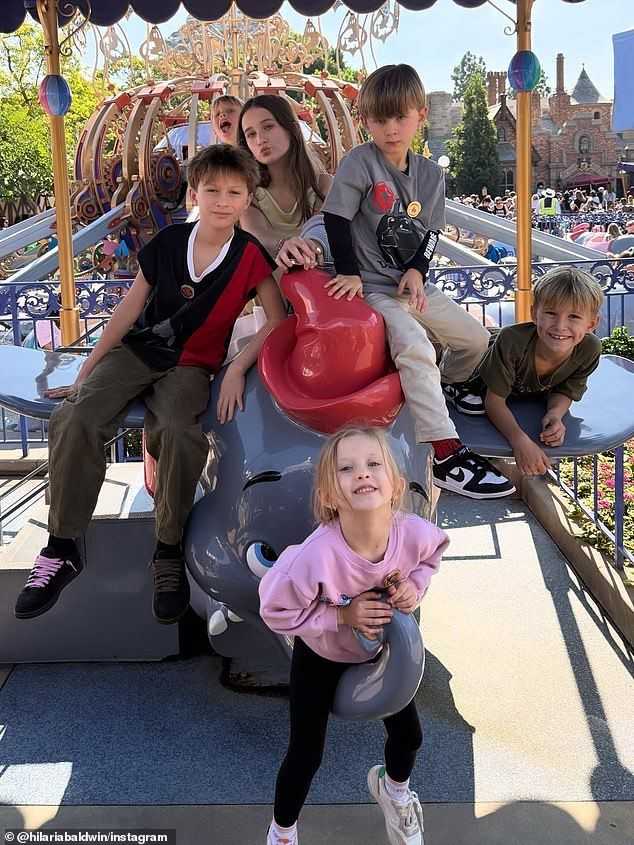 The Baldwin children were seen posing at the amusement park in Orange County, California