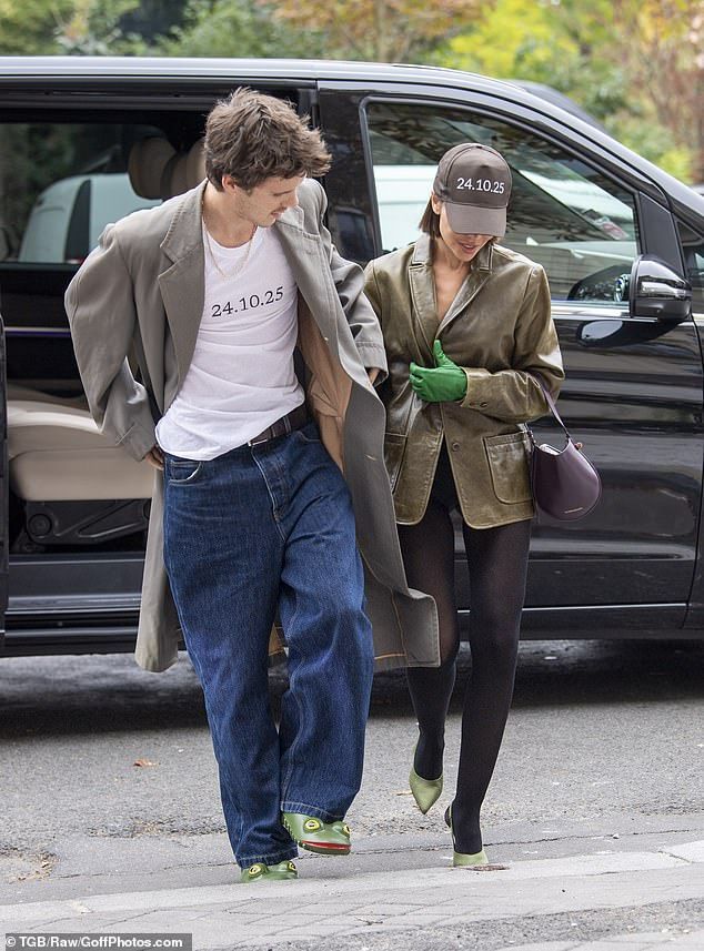 Meanwhile, Jackie also promoted Victoria's latest issue with the magazine as she sported a chocolate brown baseball cap, featuring the same date