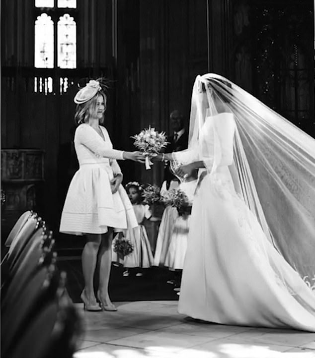 Then, one year on, the Duke and Duchess of Sussex took to Instagram to post a series of intimate images from their incredible day. One key image finally solved the bouquet mystery: Prince Harry's then assistant Clara Madden was captured handing Meghan the