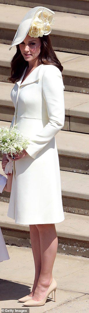 The woman in question was seen wearing a light coloured ensemble that bore an incredible resemblance to the off-white Alexander McQueen outfit donned by Kate on the royal wedding day