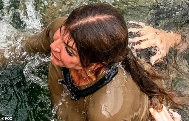 Here she is seen in the water as her fear of drowning gets the better of her