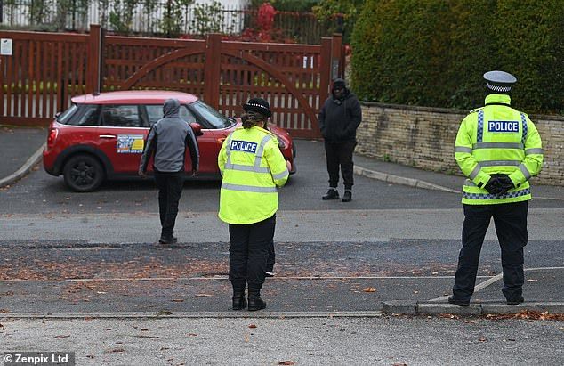 High alert: Additional security and a police presence were seen outside a synagogue in Hale Barnes, Altrincham on Saturday morning