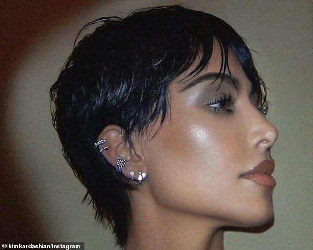 Kim's dewey, dreamy makeup was applied by celebrity artist Raoul and her wig was installed by her longtime hair consultant Chris Appleton