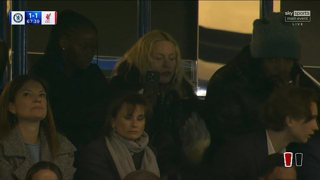 Madonna, 67, kept a very low profile as she blended into the crowd with her toy boy lover Akeem Morris, 29, to support Chelsea against Liverpool at Stamford Bridge on Saturday