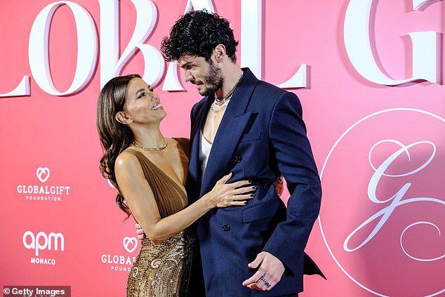 The Desperate Housewives star was joined on the red carpet by Baptiste Giabiconi, with the pair beaming and wrapping their arms around each other as they posed for photos