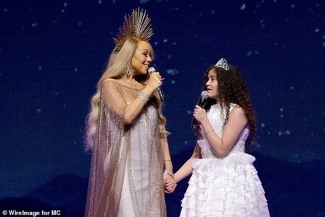 Mariah Carey' nepo baby daughter is reportedly set to follow in her mother's footsteps in the music industry (seen performing together in 2023)