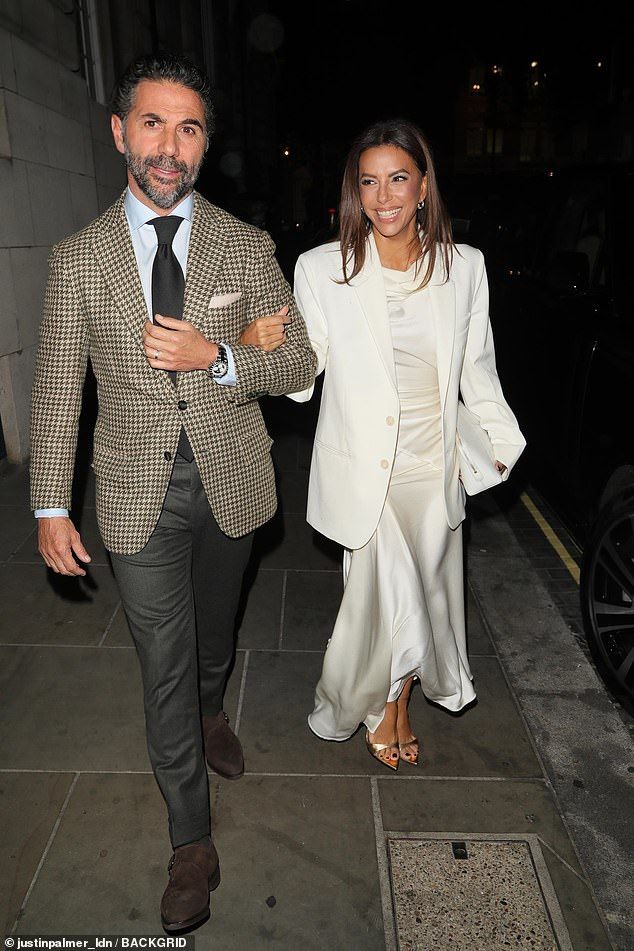 Eva couldn't contain her giggles as she arrived into the after party