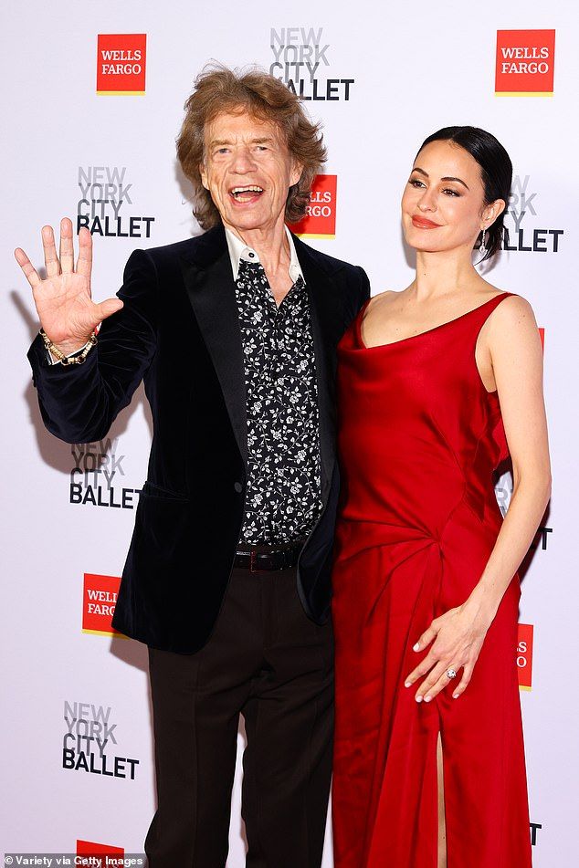 However, the rocker opted for simple black trousers instead of tuxedo pants. He dressed down the look with black Nike sneakers