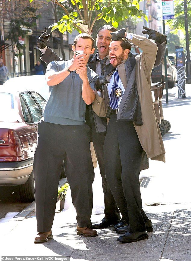 But the talented trio were all smiles goofing around and taking selfies when the cameras stopped rolling